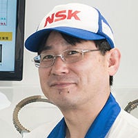 磯 賢一