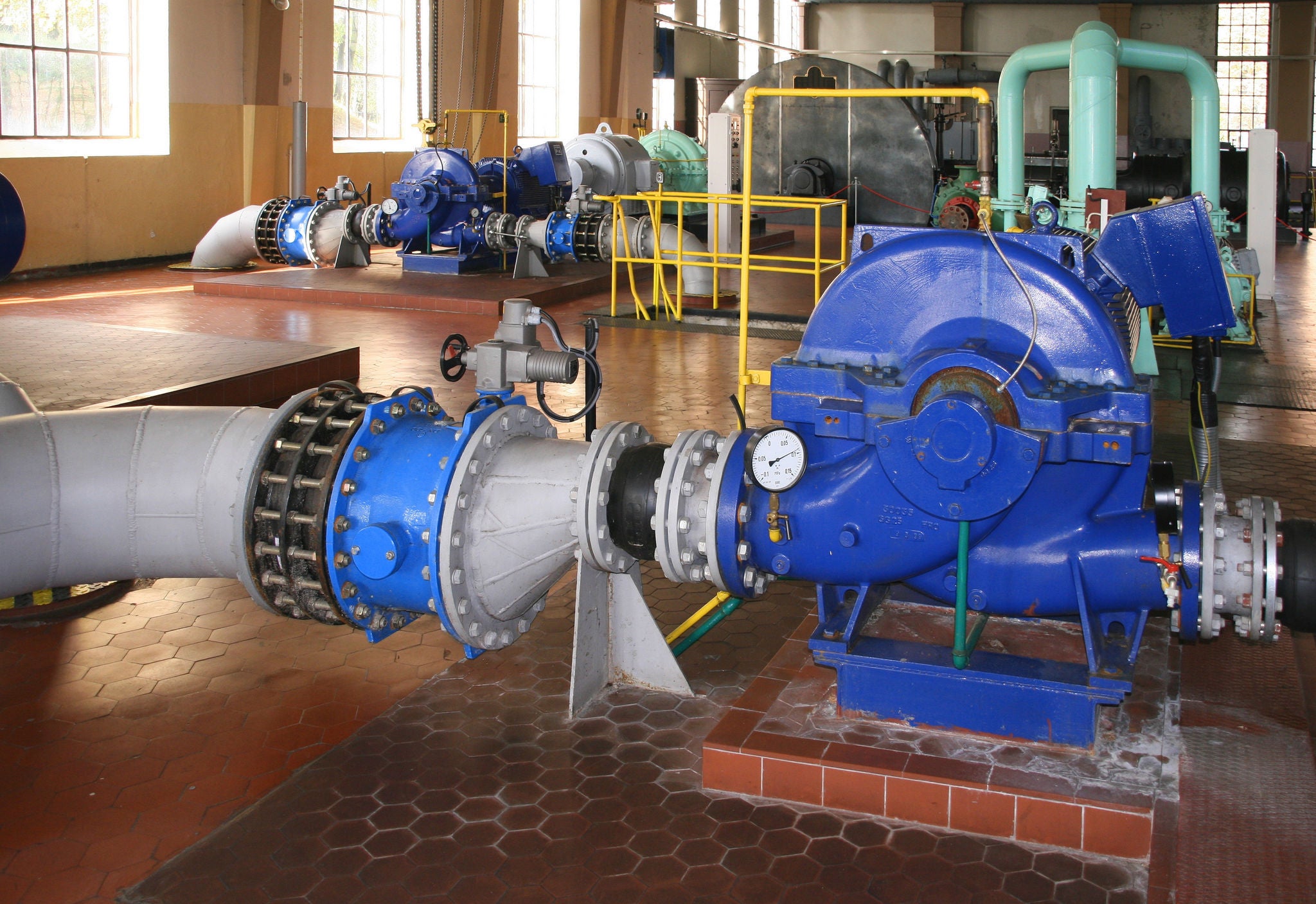 IN_Pumps_shutterstock_5841544.jpg Water pumping station - industrial interior and pipes
